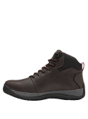 Calzado robusto de cuero y textil, diseñado para protección en trabajos exigentes, con soporte adicional al tobillo.