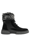 Calzado casual de cuero negro, para mujer, con diseño robusto y detalles que aseguran aislamiento térmico y comodidad.