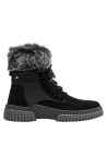 Calzado casual de cuero negro, para mujer, con diseño robusto y detalles que aseguran aislamiento térmico y comodidad.