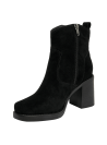 Clásico botín negro de cuero para mujer, diseño funcional con taco medio y estabilidad al caminar, ideal para el día a día.