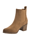 Versátil botín de cuero camel estilo chelsea para mujer, ideal para combinar con diversas vestimentas y ocasiones.