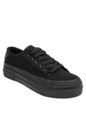 Zapatilla negra colegial de niño, diseño clásico urbano, lona resistente y flexible, ideal para uso cotidiano.