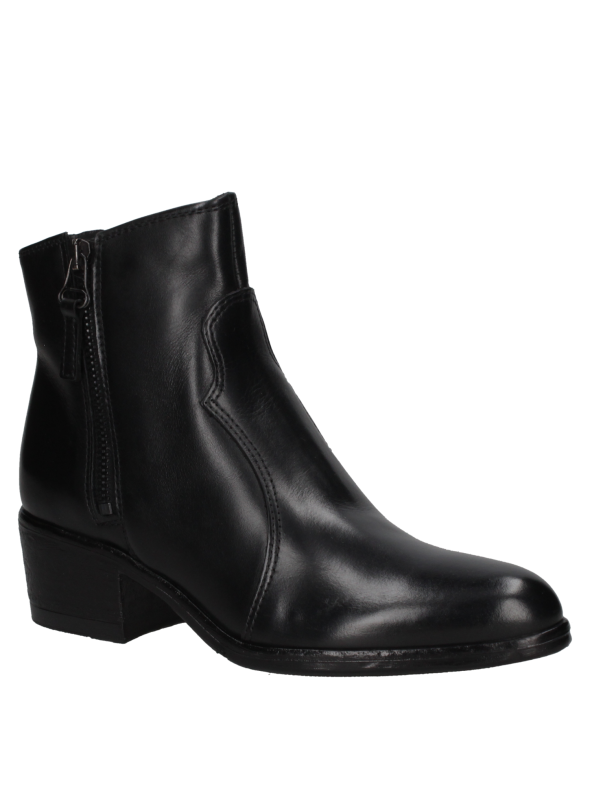 Botín de cuero negro para mujer, suela robusta adecuada para diversas superficies, versátil para distintas ocasiones.