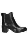 Botín Chelsea negro de cuero para mujer, con diseño sofisticado y caña corta, ideal para combinar con cualquier atuendo.