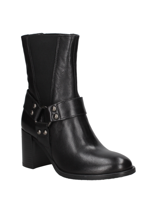 Cuero negro en botín de mujer, con cierre elástico oculto y diseño moderno, ideal para un uso prolongado y confortable.