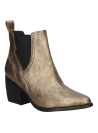 Botín Chelsea color oro de cuero para mujer, con ajuste cómodo gracias al panel elástico y lengüeta trasera.