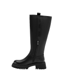 Bota de cuero negro para mujer, diseño moderno con tirador trasero y suela gruesa, adecuada para caminar en invierno.