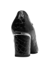 Clásico zapato de cuero negro para mujer, perfecto equilibrio entre lo formal y cotidiano, adecuado para cenas elegantes.
