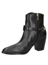 Botín negro de cuero para mujer con diseño elegante y funcional, ideal para ocasiones casuales o formales.