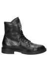 Botín negro de cuero para mujer, suela de goma para tracción y durabilidad, perfecto para uso urbano.
