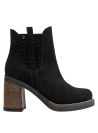 Botín negro de cuero estilo Chelsea para mujer, con caña hasta el tobillo y detalle trenzado en los laterales.