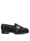 Mocasín casual de cuero negro para mujer, diseño sofisticado con hebilla que añade modernidad y estabilidad.