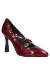 Zapato de cuero burdeo para mujer, estilo vestir, con diseño sofisticado y taco alto, ideal para eventos formales.
