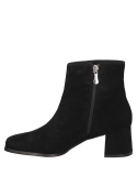 Botín de cuero negro para mujer, corte clásico sobre el tobillo, adecuado para la oficina o cenas con amigos.