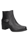 Botín de cuero negro para mujer con estilo atemporal, comodidad y protección contra el frío en temporadas frías.