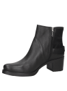 Botín de cuero negro para mujer con diseño clásico y sofisticado, versátil para oficina o citas nocturnas.
