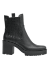 Botín Chelsea negro de cuero femenino, ideal para un look contemporáneo, perfecto para la oficina o salidas.