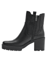 Elegante botín Chelsea negro de cuero, diseñado para mujer, combina con atuendos casuales y formales.