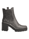 Botines Chelsea de cuero metalizado, ideales para mujeres que desean un calzado versátil y chic.
