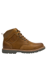 Botín camel de cuero para hombre, diseño moderno y audaz para uso urbano.