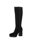 Calzado femenino de cuero negro, bota casual versátil para combinar con ropa urbana.