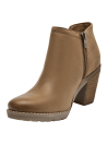 Botín café de cuero para mujer con diseño moderno y elegante, ideal para un estilo casual chic en el día a día.