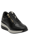 zapatilla estilizada de cuero negro para mujer, combinando comodidad y estilo deportivo con detalles funcionales.