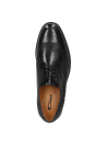 Zapato de vestir negro de cuero para hombre con diseño Oxford brogue, ideal para eventos formales por su elegancia.