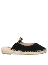 Calzado femenino estilo casual negro, alpargata de cuero con talón descubierto, ideal para ocasiones informales.