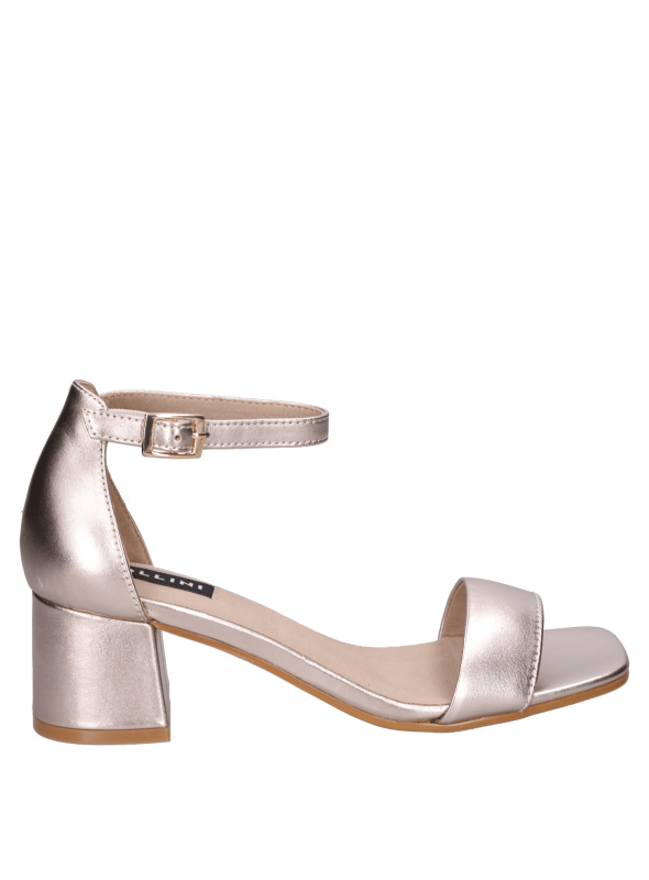 Sandalia de mujer en cuero dorado, estilo minimalista y moderno, ideal para combinar con vestidos de verano.