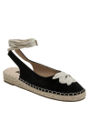 Alpargata casual de cuero negro para mujer, con lazo decorativo y suela de yute.
