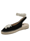 Alpargata de cuero negro para mujer, con lazo beige y cintas al tobillo, estilo casual boho-chic.