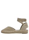Calzado casual beige de cuero para mujer, ideal para combinar con vestidos veraniegos y faldas midi.