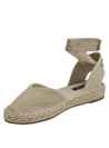 Alpargata de cuero beige para mujer con detalle de amarre al tobillo y suela de esparto, estilo casual boho-chic.
