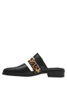 Calzado casual de cuero negro con detalle animal print y hebilla dorada, ideal para eventos semi-formales.