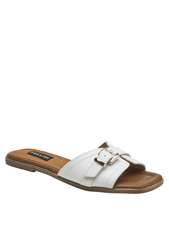 Textura lisa del cuero blanco en sandalia casual de mujer, sensación de limpieza y sofisticación.