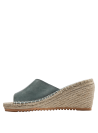 Sandalia de mujer en cuero azul con plataforma de yute, perfecta para eventos informales o semi-formales.