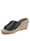 Sandalia casual de cuero negro con suela de esparto estilo boho-chic para un look versátil.