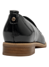 Mocasín de cuero negro charolado para mujer, estilo casual, ideal para ocasiones semi-formales.