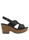 Sandalia negra de cuero versátil, perfecta para eventos casuales o semi-formales.