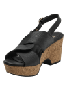 Sandalia de cuero negro para mujer con tiras cruzadas y hebilla dorada, estilo casual y sofisticado.