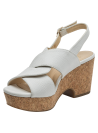 Sandalia de cuero blanco con plataforma de corcho y cuña, ideal para looks veraniegos.