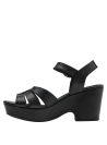 Calzado de mujer en cuero negro con plataforma y tacón cuña, perfecto para eventos semi-formales.