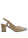 Zapato de cuero beige para mujer, sofisticado y versátil, con taco cómodo para oficina.