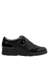 Calzado de cuero negro charol para mujer, perfecto para el trabajo y salidas informales.