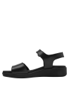 calzado casual de cuero negro, plataforma baja, diseño minimalista y elegante para uso diario.