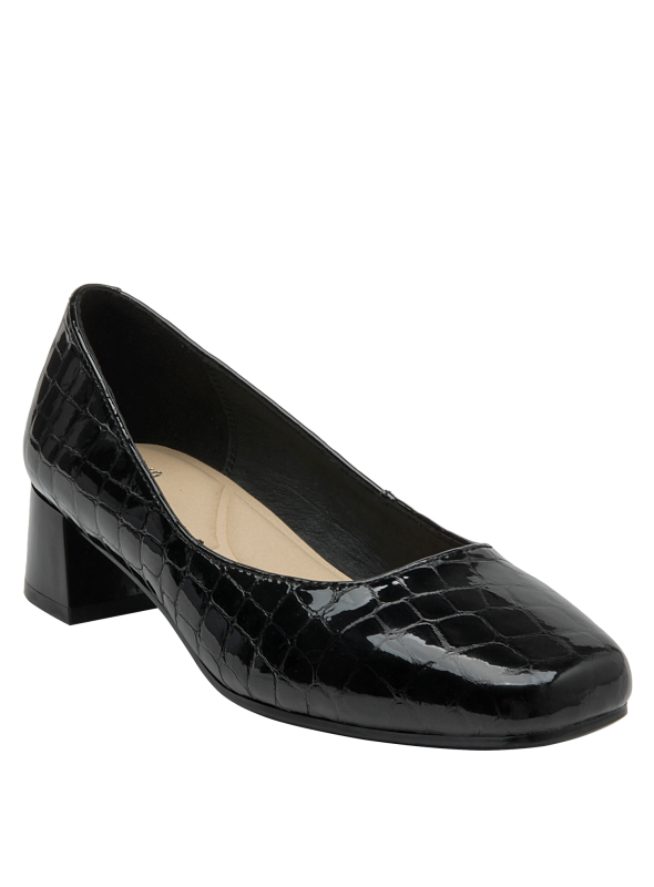 Zapato de cuero negro con diseño clásico y tacón bajo, perfecto para oficina.