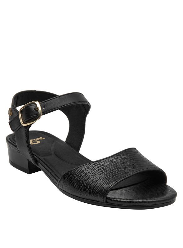 Cuero negro con textura grabada en sandalia formal para mujer, perfecta para eventos de día.
