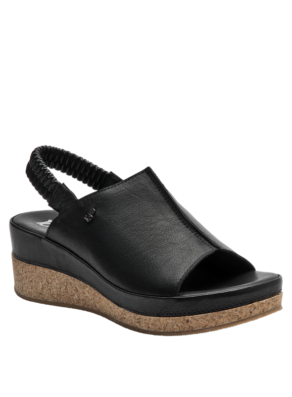 Sandalia moderna y versátil de cuero negro, ideal para looks casuales chic.