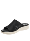 Sandalia negra deportiva de mujer en textil suave y mate con suela blanca contrastante.